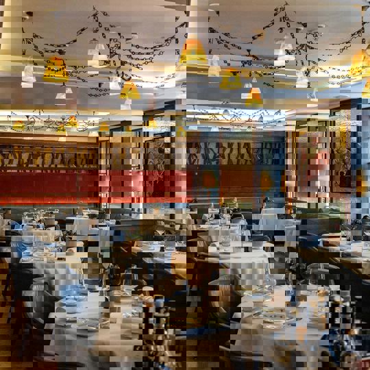 Interior shot of laid tables at Corrigan's Mayfair