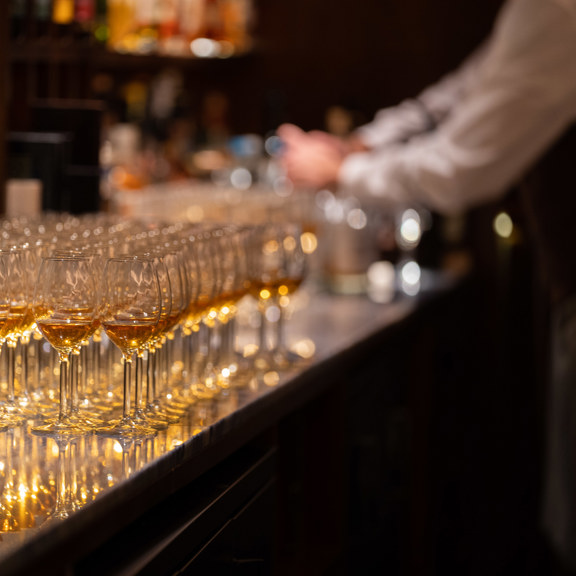 Glasses on wine on the bar at Corrigan's Mayfair