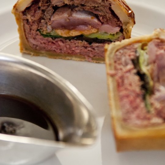 Game pie cut in half