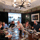 Group of guests having a birthday celebration round a table at Corrigan's Mayfair